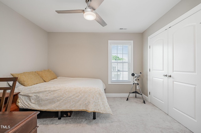 45 Leighann Ct S, Timberlake, NC 27583 - bedroom featuring light carpet, a closet, baseboards, and ceiling fan