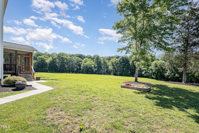 45 Leighann Ct S, Timberlake, NC 27583 - view of grassy yard with a sunroom