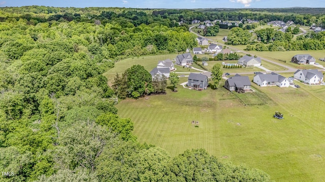 45 Leighann Ct S, Timberlake, NC 27583 - aerial view of residential area featuring a forest