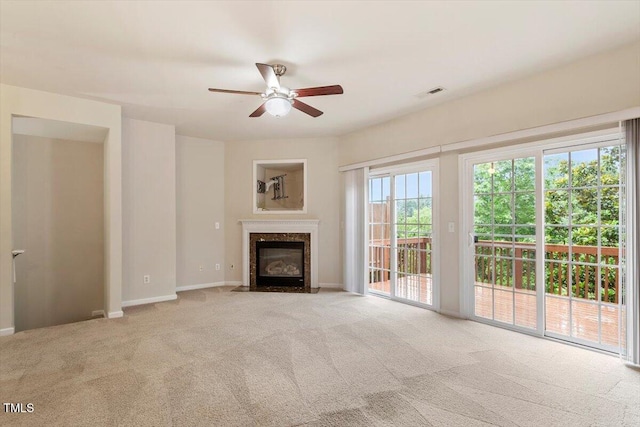 615 Carlton Commons Ln, Cary, NC 27519 - unfurnished living room featuring carpet, ceiling fan, a fireplace, and baseboards