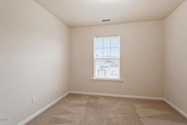 615 Carlton Commons Ln, Cary, NC 27519 - unfurnished room featuring baseboards and light carpet