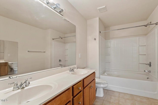 615 Carlton Commons Ln, Cary, NC 27519 - bathroom featuring toilet, double vanity, bathtub / shower combination, and tile patterned floors