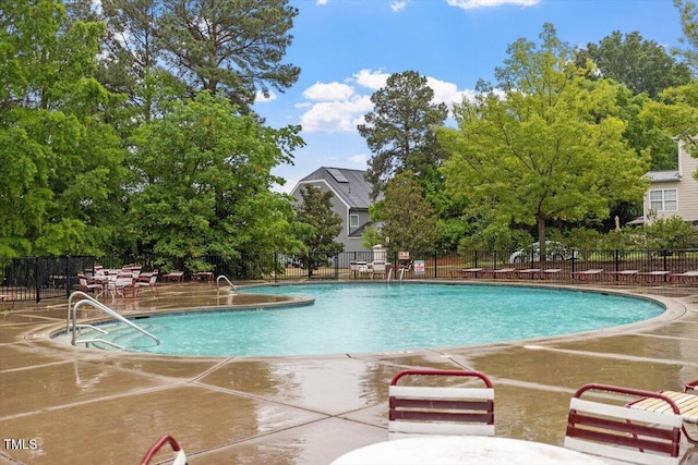 615 Carlton Commons Ln, Cary, NC 27519 - community pool featuring a patio