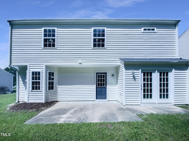5828 Brambleton Ave, Raleigh, NC 27610 - rear view of house with a patio area and a lawn