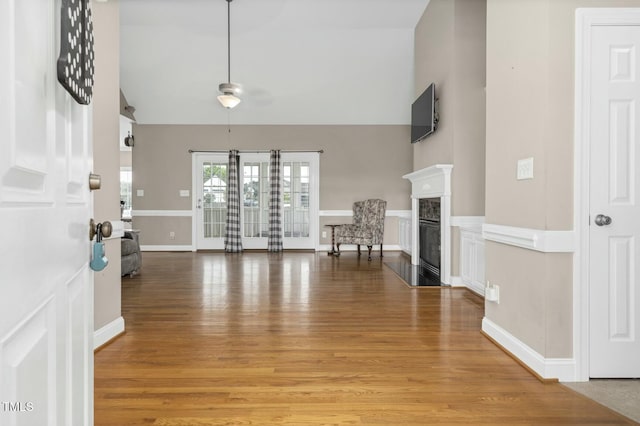 1454 Spring Pond Rd, Nashville, NC 27856 - foyer featuring high vaulted ceiling, light wood-style floors, and a premium fireplace