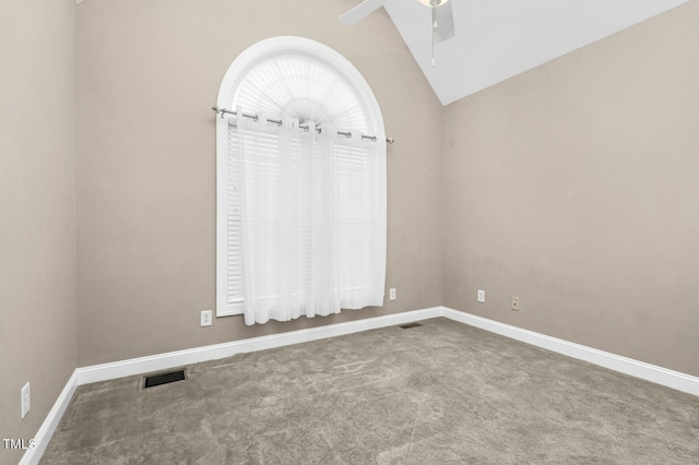 1454 Spring Pond Rd, Nashville, NC 27856 - carpeted spare room with visible vents, baseboards, a ceiling fan, and vaulted ceiling