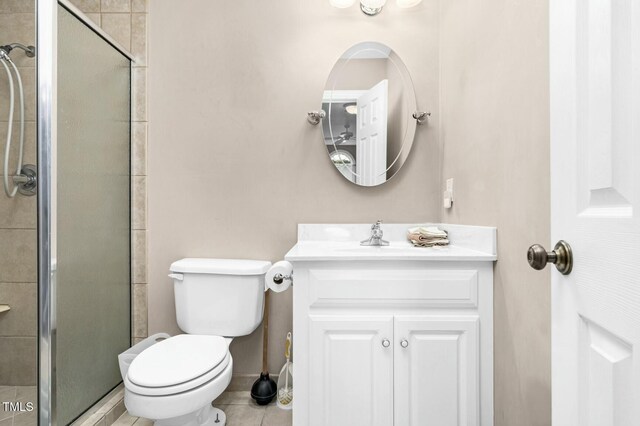 1454 Spring Pond Rd, Nashville, NC 27856 - full bathroom featuring toilet, vanity, and a stall shower