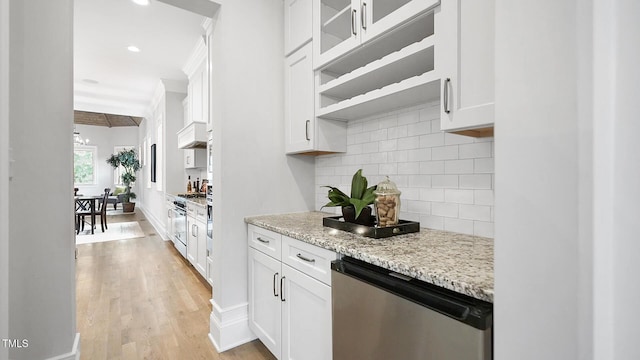 bar area with decorative backsplash, stainless steel dishwasher, light wood-style floors, recessed lighting, and ventilation hood
