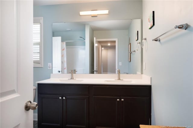 429 Letterfearn Dr, Fayetteville, NC 28311 - full bathroom featuring toilet, double vanity, and a shower with curtain