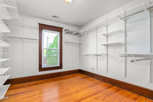 104 E Wilson St, Mebane, NC 27302 - walk in closet with wood finished floors