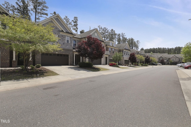 view of road featuring a residential view and sidewalks