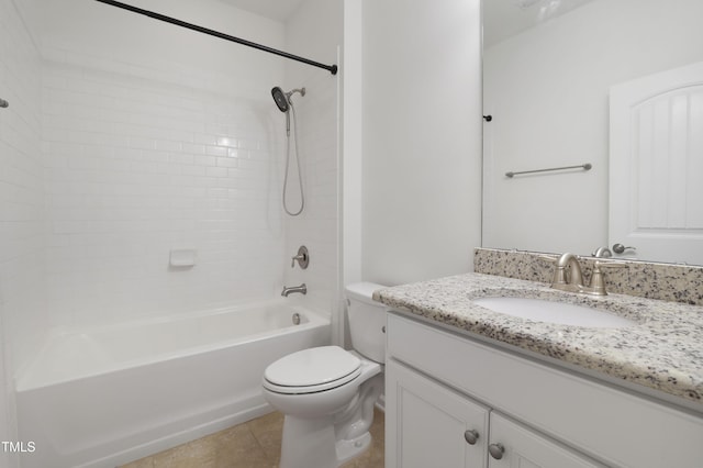 bathroom with tile patterned flooring, washtub / shower combination, toilet, and vanity