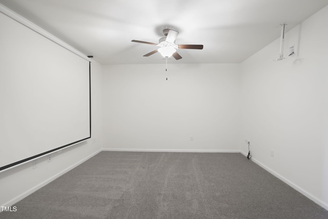 cinema featuring baseboards, carpet flooring, and ceiling fan