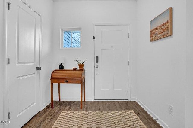 1501 Addison Lake St, Fuquay Varina, NC 27526 - entryway with dark wood finished floors and baseboards