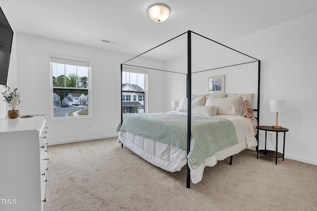 1501 Addison Lake St, Fuquay Varina, NC 27526 - carpeted bedroom with baseboards and visible vents
