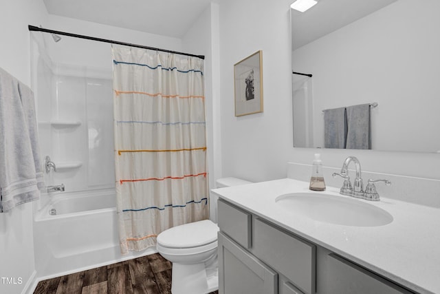 1501 Addison Lake St, Fuquay Varina, NC 27526 - full bath featuring shower / bath combo with shower curtain, wood finished floors, vanity, and toilet