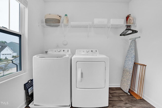 1501 Addison Lake St, Fuquay Varina, NC 27526 - washroom featuring dark wood finished floors, baseboards, laundry area, and separate washer and dryer