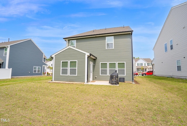 1501 Addison Lake St, Fuquay Varina, NC 27526 - rear view of house with a yard and a patio