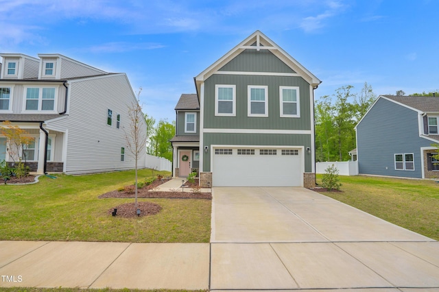 1501 Addison Lake St, Fuquay Varina, NC 27526 - craftsman-style home featuring a front lawn, stone siding, concrete driveway, fence, and a garage