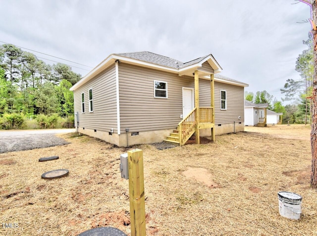 48 S Grace Way, Henderson, NC 27537 - view of front of house with crawl space and a shingled roof