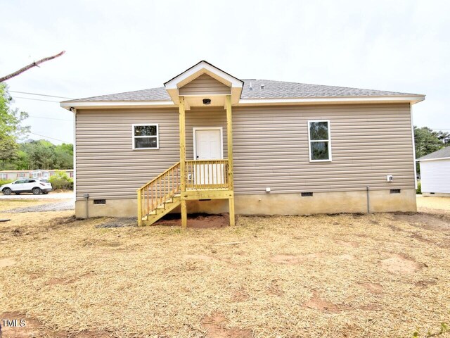 48 S Grace Way, Henderson, NC 27537 - view of front of home with crawl space and a shingled roof