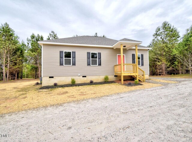 48 S Grace Way, Henderson, NC 27537 - view of front of home with crawl space and roof with shingles