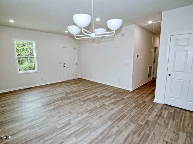 48 S Grace Way, Henderson, NC 27537 - interior space featuring visible vents, baseboards, wood finished floors, and recessed lighting