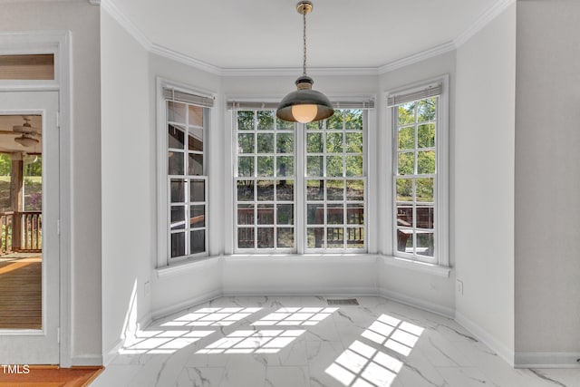 unfurnished dining area featuring plenty of natural light, visible vents, marble finish floor, and baseboards