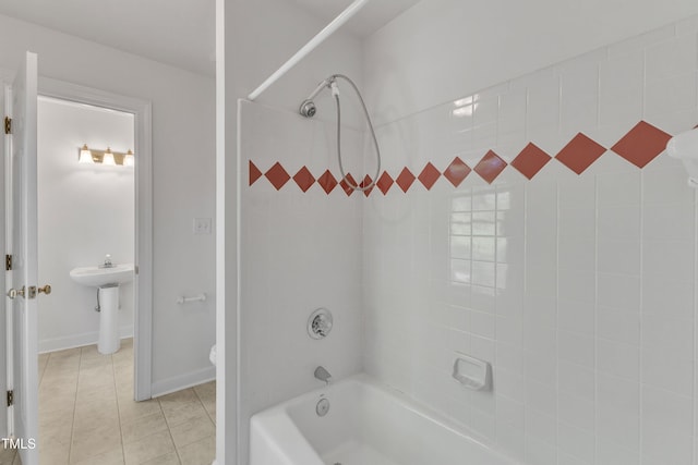 full bathroom featuring bathtub / shower combination, tile patterned flooring, and toilet
