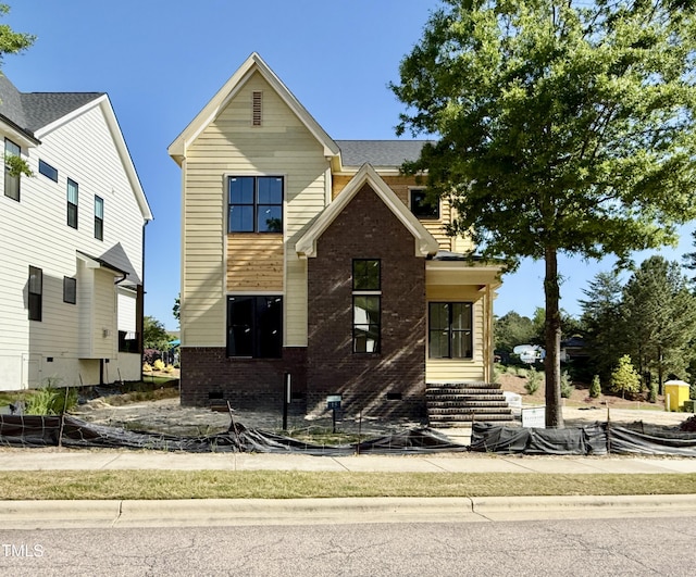 view of front facade with brick siding