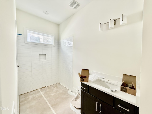 3817 Coach Lantern Ave, Wake Forest, NC 27587 - full bath featuring vanity, concrete floors, and tiled shower