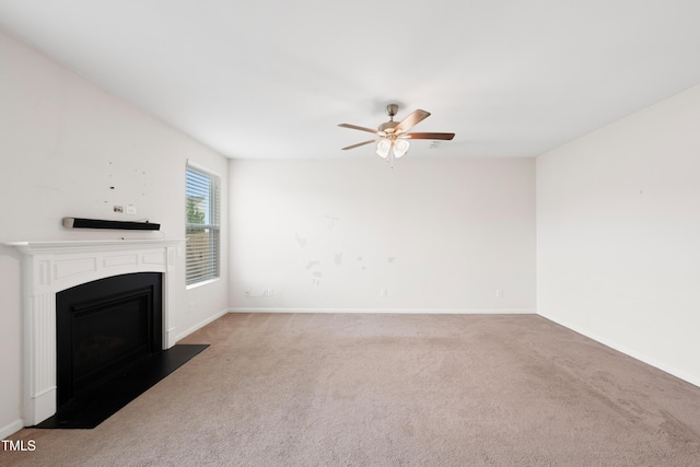 3513 Diamond Springs Dr, Raleigh, NC 27610 - unfurnished living room with baseboards, a ceiling fan, carpet floors, and a fireplace with flush hearth