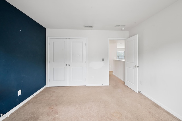 3513 Diamond Springs Dr, Raleigh, NC 27610 - unfurnished bedroom featuring a closet, visible vents, carpet, and baseboards