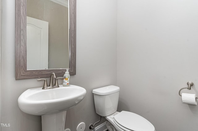 bathroom with a sink and toilet