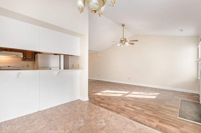 unfurnished living room with baseboards, high vaulted ceiling, ceiling fan with notable chandelier, and light wood-style floors