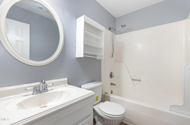 bathroom featuring toilet, bathtub / shower combination, and vanity