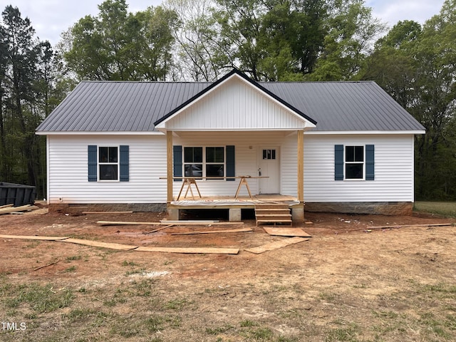2234 Burch Bridge Rd, Burlington, NC 27217 - rear view of property with covered porch, crawl space, and metal roof