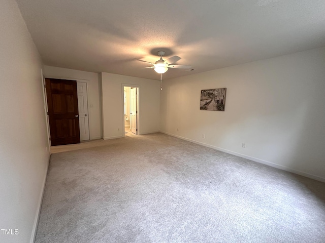 2708 Halfhitch Trl, Raleigh, NC 27615 - empty room featuring a ceiling fan, light carpet, and baseboards