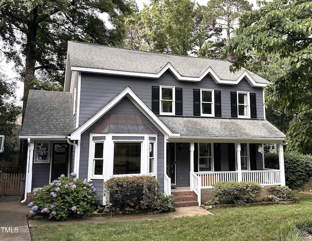 2708 Halfhitch Trl, Raleigh, NC 27615 - view of front of house with covered porch and a shingled roof