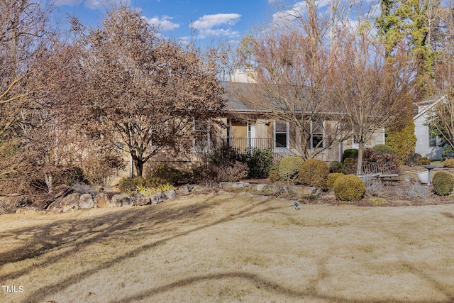 view of property hidden behind natural elements