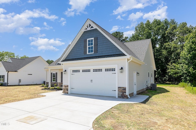 1000 Peedin Rd, Selma, NC 27576 - craftsman-style house with a front yard, stone siding, and concrete driveway