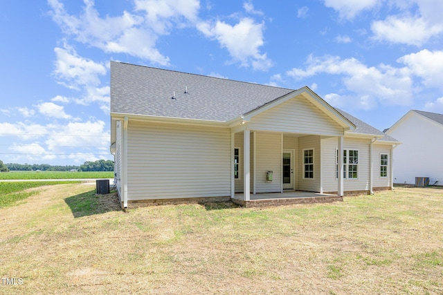 1000 Peedin Rd, Selma, NC 27576 - back of house with a patio, a lawn, and roof with shingles