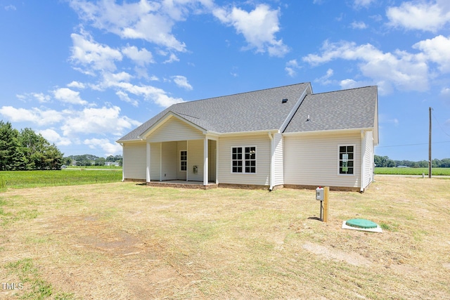 1000 Peedin Rd, Selma, NC 27576 - rear view of property with a shingled roof and a yard