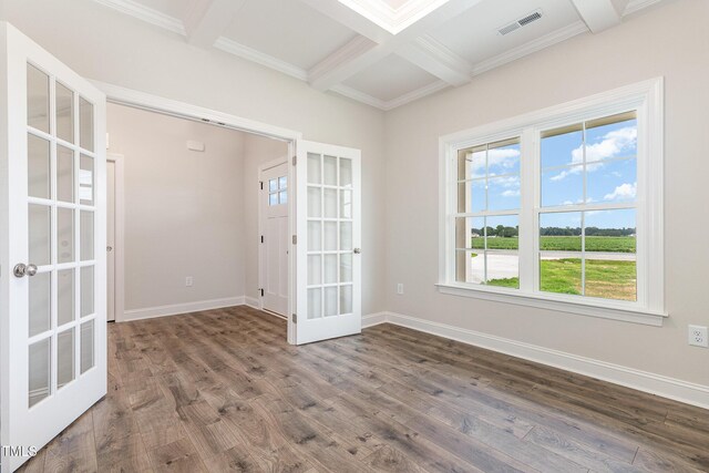 1000 Peedin Rd, Selma, NC 27576 - spare room with french doors, beamed ceiling, wood finished floors, coffered ceiling, and crown molding