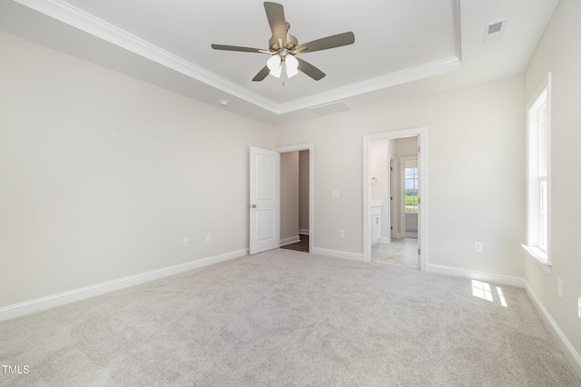 1000 Peedin Rd, Selma, NC 27576 - unfurnished bedroom featuring ornamental molding, a raised ceiling, carpet floors, and ceiling fan