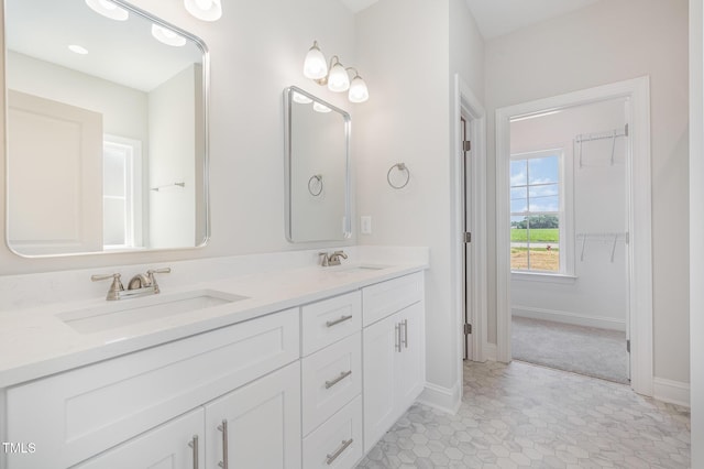 1000 Peedin Rd, Selma, NC 27576 - full bathroom featuring double vanity and baseboards