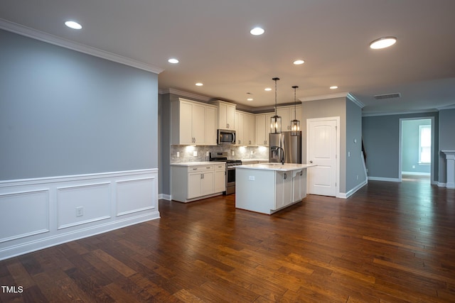 1007 Fairhaven Dr, Mebane, NC 27302 - kitchen featuring light countertops, crown molding, tasteful backsplash, appliances with stainless steel finishes, and dark wood-style flooring
