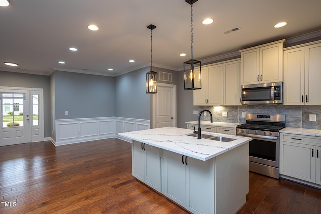1007 Fairhaven Dr, Mebane, NC 27302 - kitchen featuring visible vents, crown molding, stainless steel appliances, and a sink