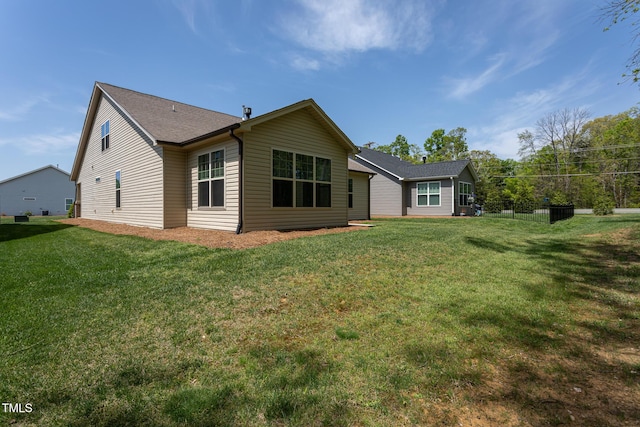 1007 Fairhaven Dr, Mebane, NC 27302 - rear view of property with a yard