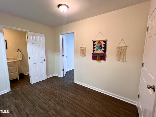 127 Long Shadow Pl, Durham, NC 27713 - unfurnished bedroom featuring dark wood finished floors and baseboards